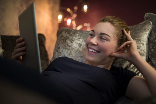 Woman watching on a tablet