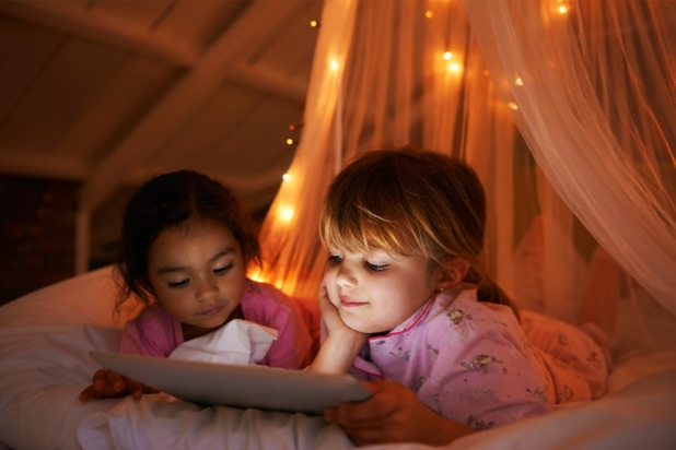 Girls watching on a tablet