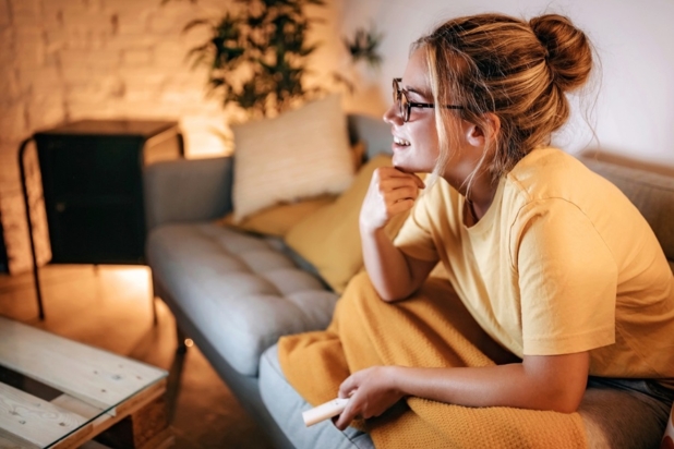 Woman watching on a tv