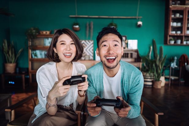 Couple playing on a game console